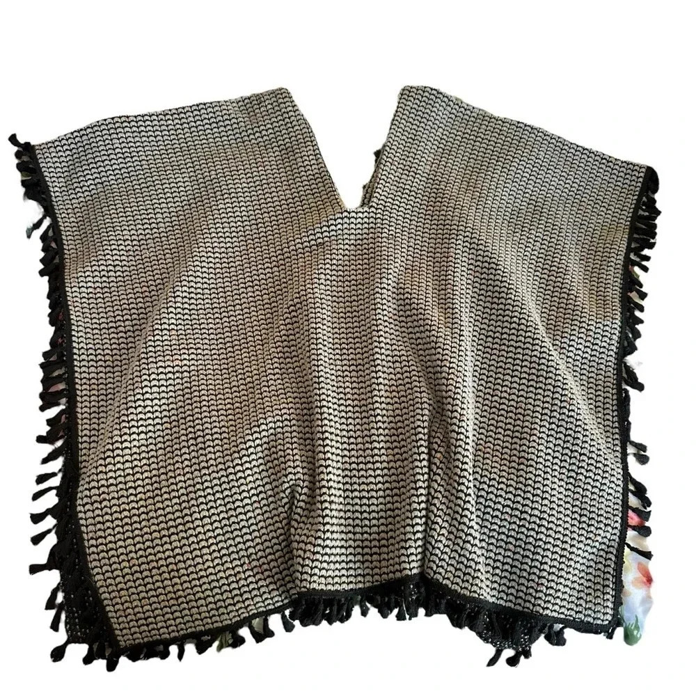 Crescent women's size small tan pancho with black tassels